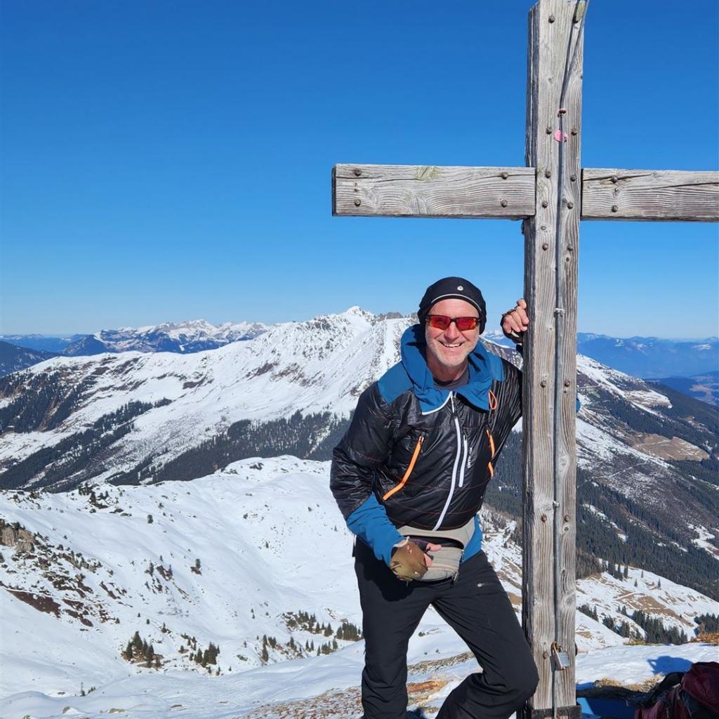 Glücksgefühle am Gipfelkreuz